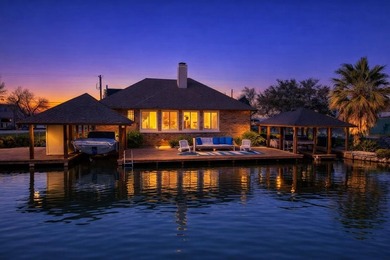 This charming waterfront retreat is perfectly positioned on a