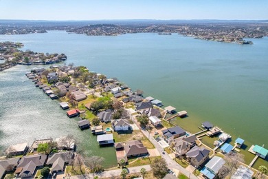 This charming waterfront retreat is perfectly positioned on a