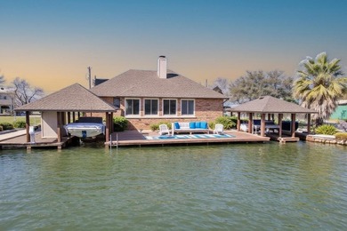 This charming waterfront retreat is perfectly positioned on a