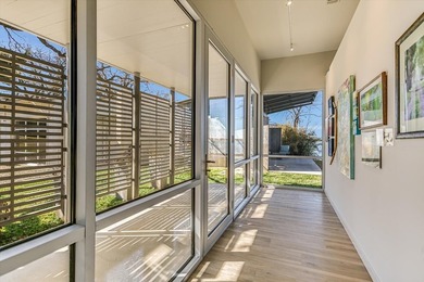 Welcome to 317 Scenic Dr., an exceptional waterfront property