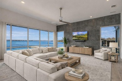 Welcome to 317 Scenic Dr., an exceptional waterfront property