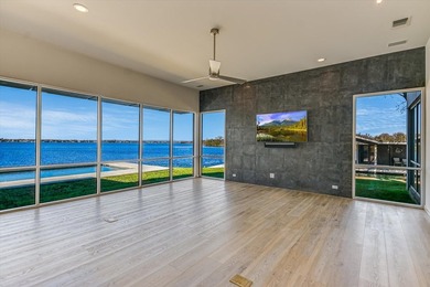 Welcome to 317 Scenic Dr., an exceptional waterfront property