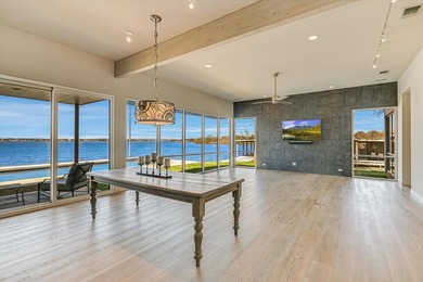 Welcome to 317 Scenic Dr., an exceptional waterfront property