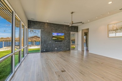 Welcome to 317 Scenic Dr., an exceptional waterfront property