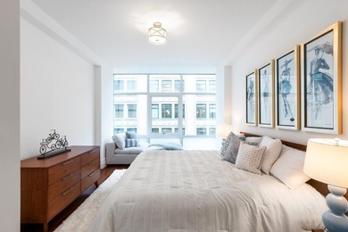 Residence 6/7A is a rare triplex loft-style home occupying the - photo 14