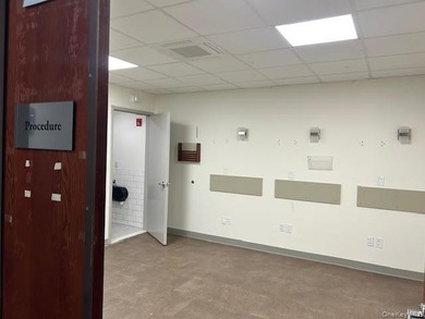 Medical office building on busy Francis Lewis Boulevard. For - photo 16