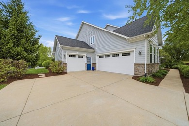 Set on a professionally landscaped lot of more than one-third - photo 3