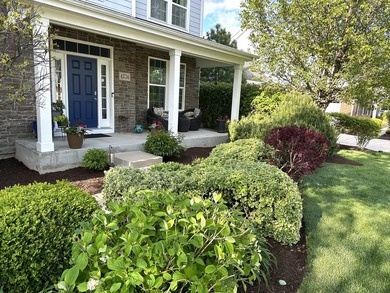 Set on a professionally landscaped lot of more than one-third - photo 5