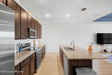 Better than new and move-in ready! This beautifully maintained - photo 7