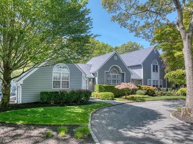 Set on 1.4 exquisitely landscaped acres in coveted East Hampton - photo 1