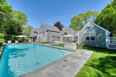 Set on 1.4 exquisitely landscaped acres in coveted East Hampton - photo 2