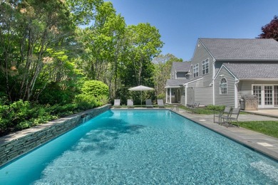 Set on 1.4 exquisitely landscaped acres in coveted East Hampton - photo 3