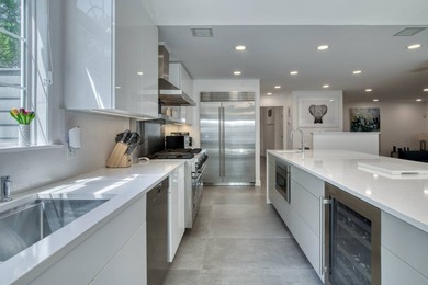 Set on 1.4 exquisitely landscaped acres in coveted East Hampton - photo 6