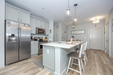 WELCOME HOME to easy coastal living in the highly sought after - photo 11