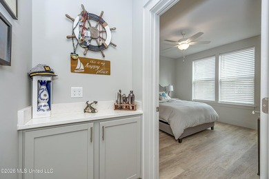WELCOME HOME to easy coastal living in the highly sought after - photo 16