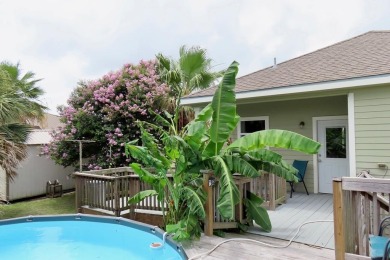 Nestled in the peaceful Copano Cove area, this charming