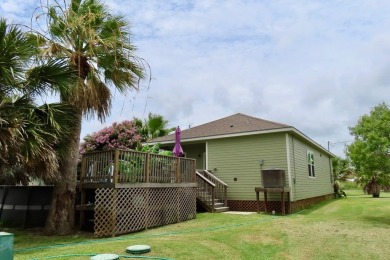 Nestled in the peaceful Copano Cove area, this charming