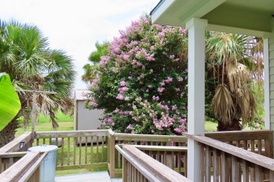Nestled in the peaceful Copano Cove area, this charming