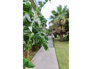 Nestled in the peaceful Copano Cove area, this charming