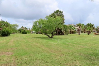 Nestled in the peaceful Copano Cove area, this charming