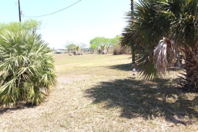 Nestled in the peaceful Copano Cove area, this charming