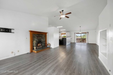 This spacious four-bedroom, four-bath home blends comfort with