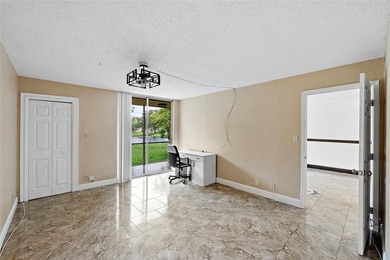 Step into comfort with this charming first-floor 2 bedroom, 2 - photo 11