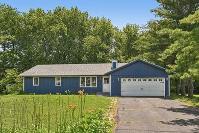 Enjoy lake community living in this bright and inviting 3 - photo 1