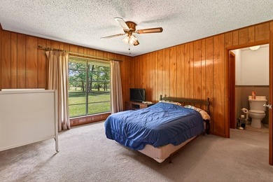 Tucked away on 10.08 beautiful acres, this 4 bedroom, 2 bath - photo 41