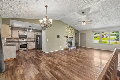Enjoy lake community living in this bright and inviting 3 - photo 6