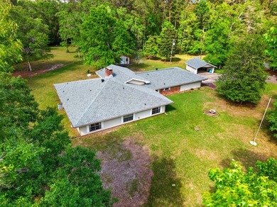 Tucked away on 10.08 beautiful acres, this 4 bedroom, 2 bath - photo 46