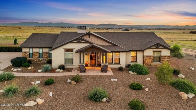 Outdoor living takes center stage in this exceptional custom