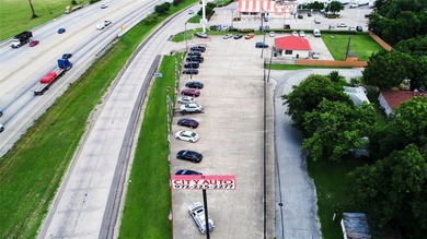 This property is 1.01 acres with highway frontage, two pointes - photo 4