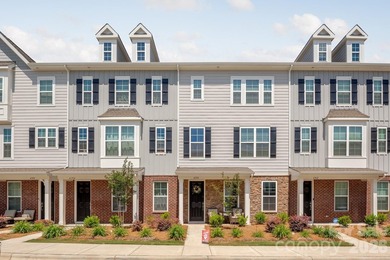 Situated in the growing lakeside community of Waterstone and - photo 1