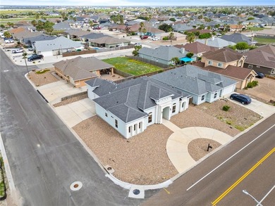 Custom home on a large corner lot with a circular driveway - photo 1