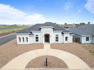 Custom home on a large corner lot with a circular driveway - photo 3