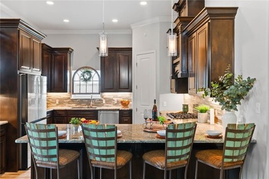 Custom home on a large corner lot with a circular driveway - photo 10