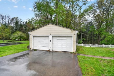 Sitting along the banks of the Neversink River, this waterfront - photo 40