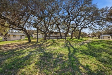 564' of Lake Buchanan shoreline. 6.3 acres. Eleven cabins. This - photo 9