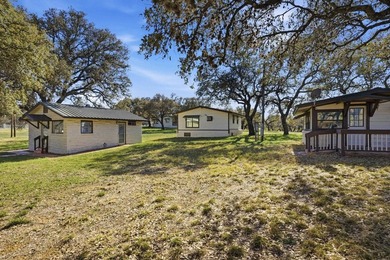 564' of Lake Buchanan shoreline. 6.3 acres. Eleven cabins. This - photo 10