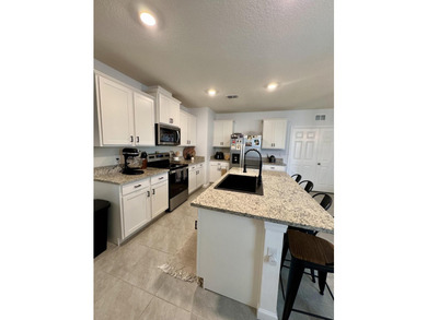 Welcome to this beautifully upgraded 3-bedroom, 2-bath CBS home - photo 12