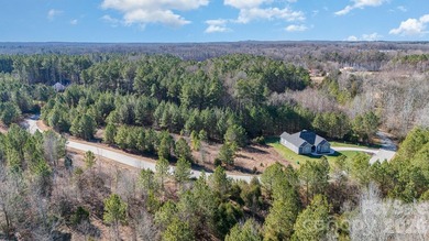 Premium full acre lot in a private gated lake community at - photo 6