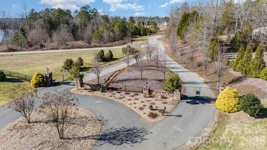 Premium full acre lot in a private gated lake community at - photo 9