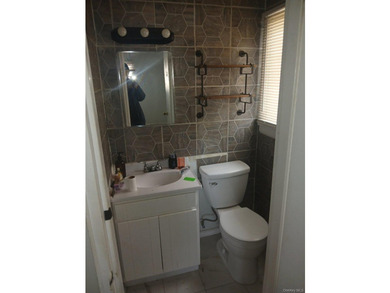 This is a charming two-family home that offers great potential - photo 18