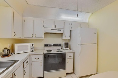 Discover serene lakefront living in this spacious 2/2 corner - photo 6
