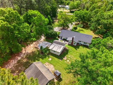 Country living on the edge of town! This 3 bedroom 2 bath home - photo 48