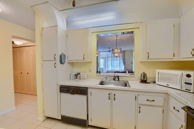Discover serene lakefront living in this spacious 2/2 corner - photo 8