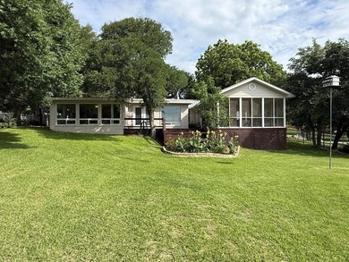 Welcome to 110 Bluebonnet Circle and experience lake living at - photo 4