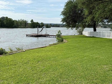 Welcome to 110 Bluebonnet Circle and experience lake living at - photo 6
