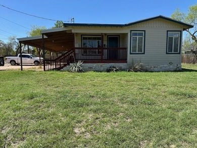 Lake Home For Sale in Cottonwood Shores, Texas